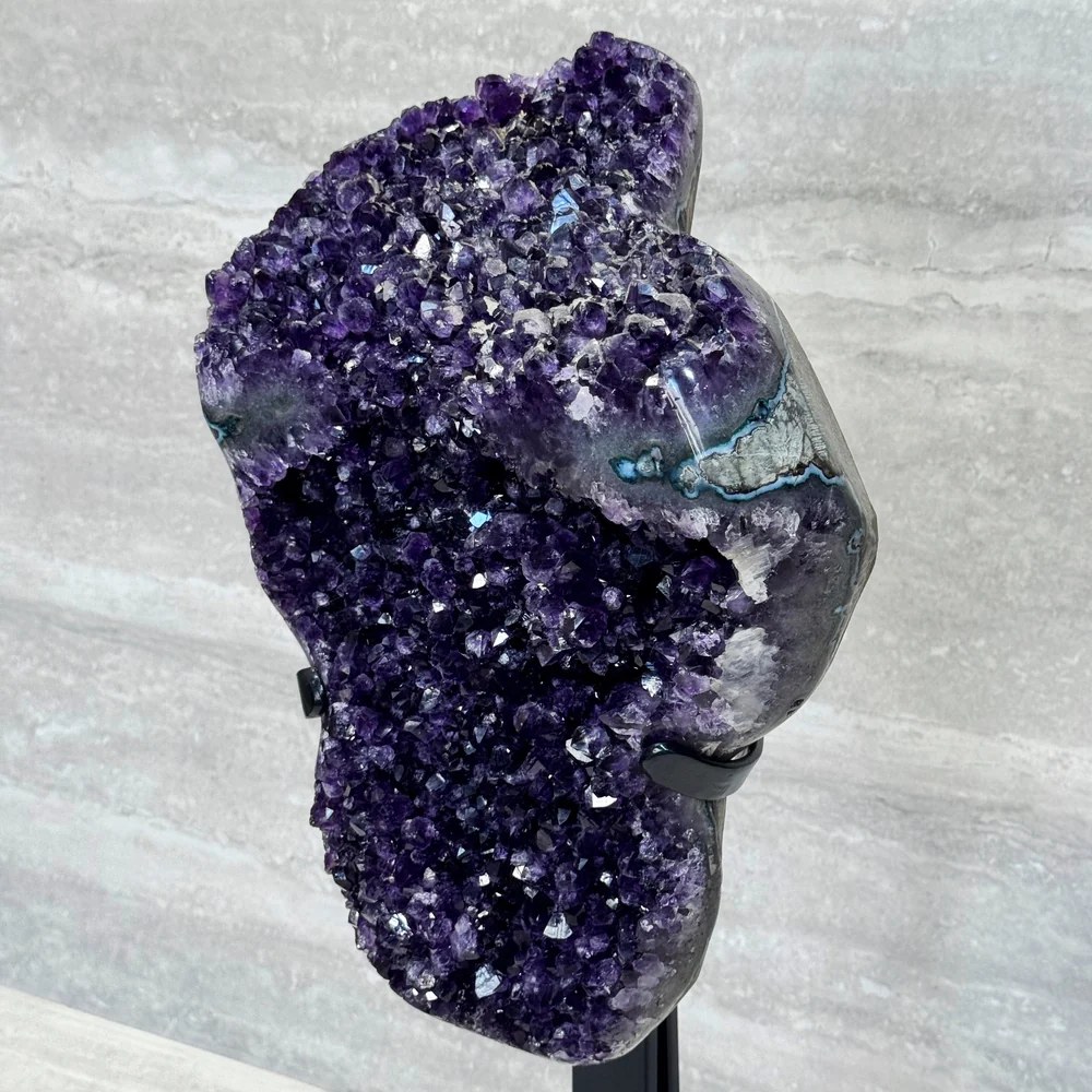 Uruguay cathedral geode on custom metal stand (27 in, 44 lbs)
